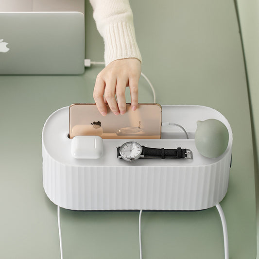 Power strip cable storage box for desk cord organisation