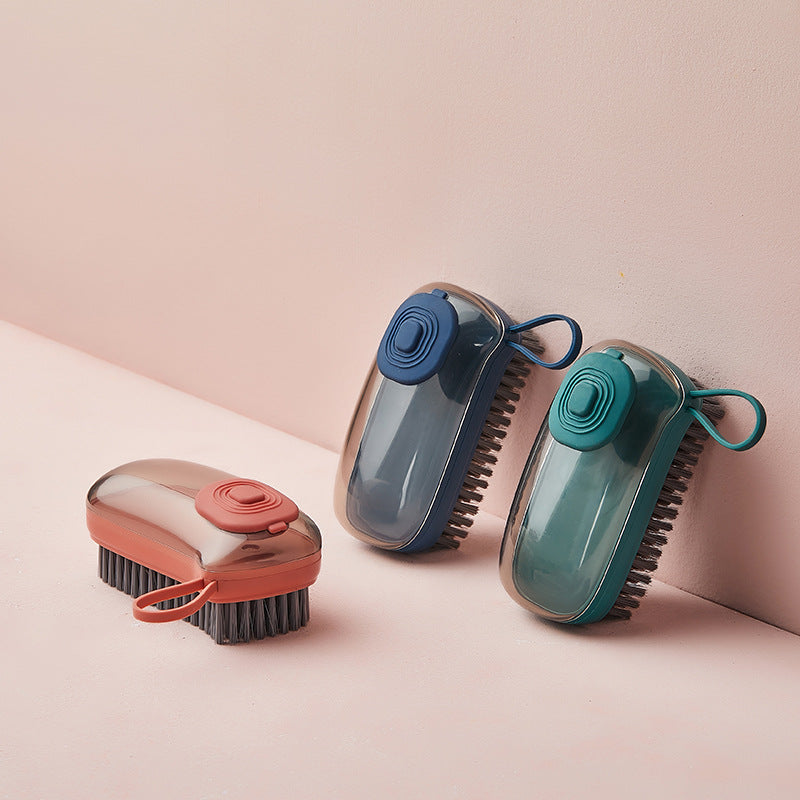 Soap-dispensing brush for shoe and laundry cleaning