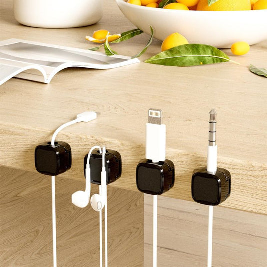 Magnetic cable clips for tidy charging cables