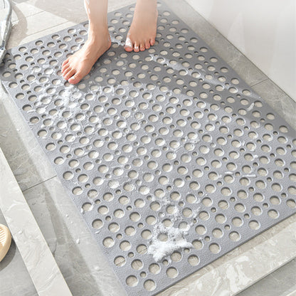 Quick-drain shower mat for bathroom floors