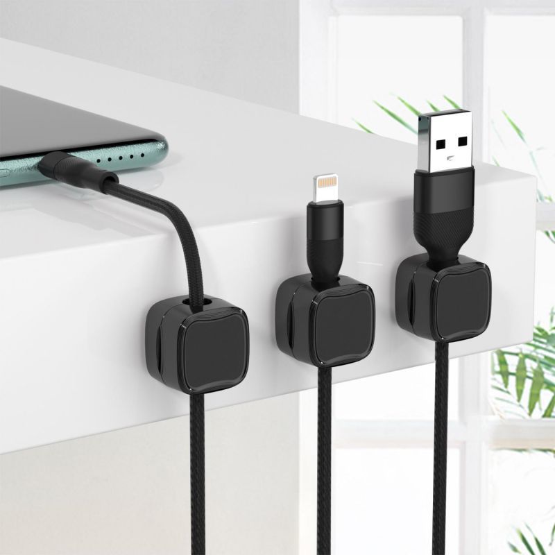 Desk cable management clips in use
