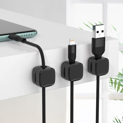 Desk cable management clips in use